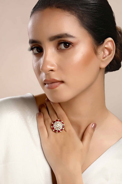 Gold and carmine moissanite and zirconia ring