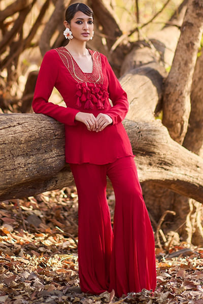Red embroidery and tasselled kurta sharara set