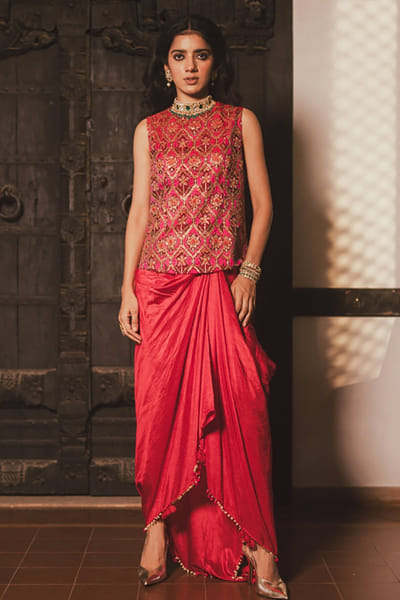 Pink and red patola printed drape skirt set