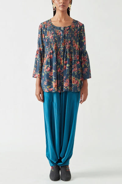 Teal pants and navy top