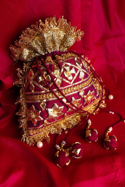 Plum gota patti embroidered potli bag