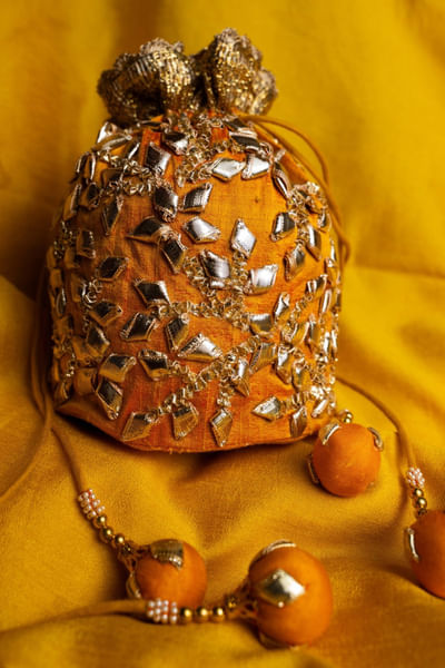 Yellow gota embroidered potli bag