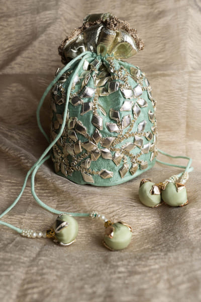 Preeti S Kapoor Aqua gota patti embroidered potli bag PREAUG25D134484