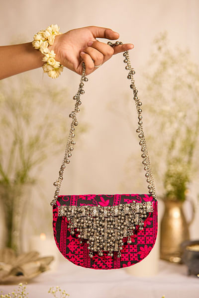 Magenta black ghungroo embellished sling bag