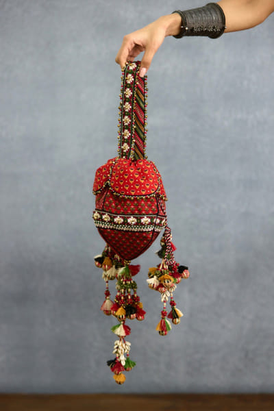 Red motif printed potli bag