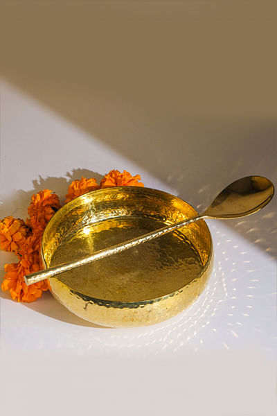Brass serving bowl and spoon
