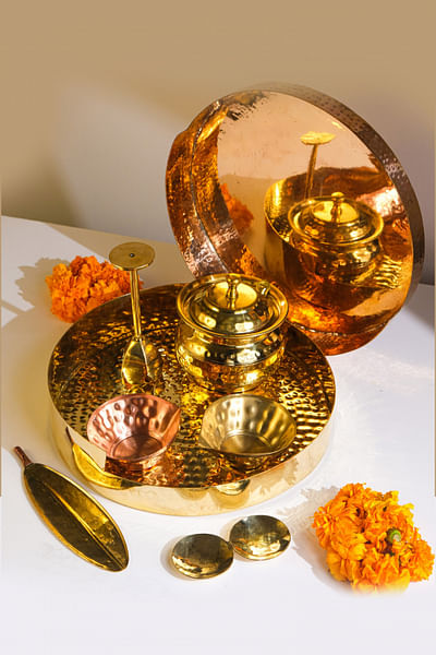 <p>Brass and copper pooja thali set without Ghee pot</p>