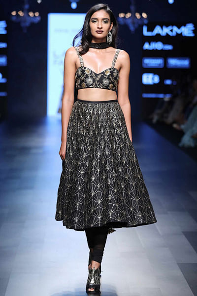 Black silk bustier with churidaar skirt and dupatta