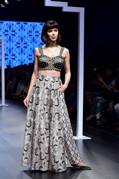 Embroidered bustier and lehenga with low-crotch pants