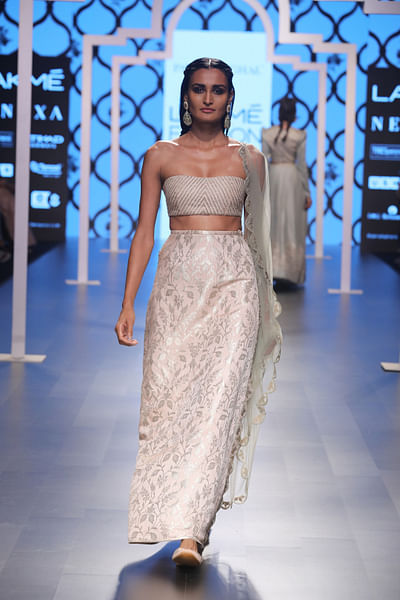 Embroidered bustier with brocade lehenga with tulle dupatta