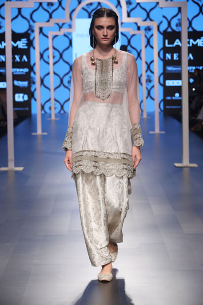 Yoke-embroidered kurta, brocade bustier, salwar and dupatta