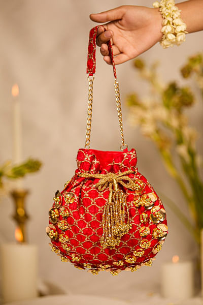 Red floral applique and embellished potli bag