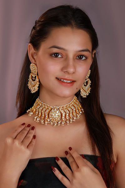 Gold and white jadtar stone pearl choker set