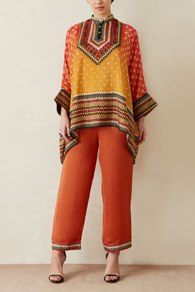 Red and yellow printed top and pants