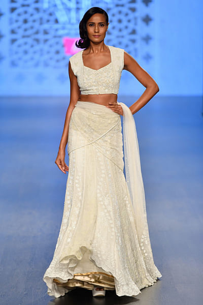 Ivory lehenga with net drape and georgette blouse