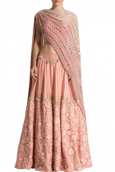 Canopy tasseled embroidered skirt with back tie up blouse and sequence draped dupatta
