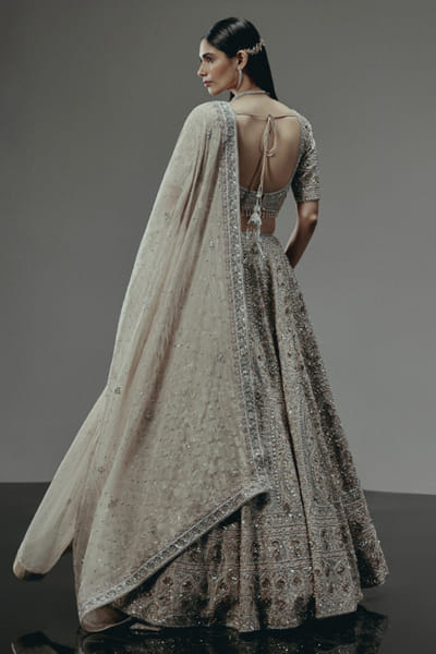 RA'KAIRA Champagne gold hand embellished lehenga set RAKAMAY26D145101