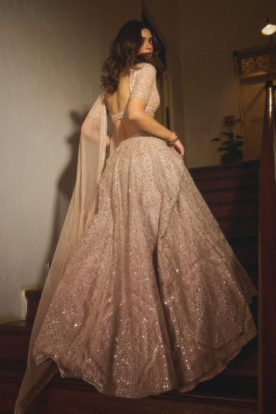 Ridhi Mehra Rose gold embroidered lehenga set RIDDEC25D133382