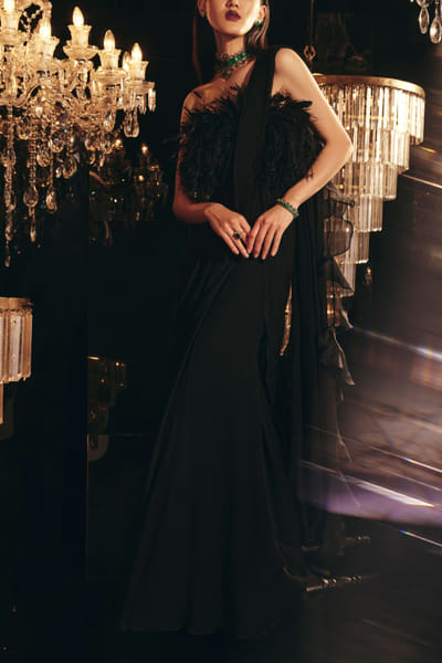 Green satin draped sari gown