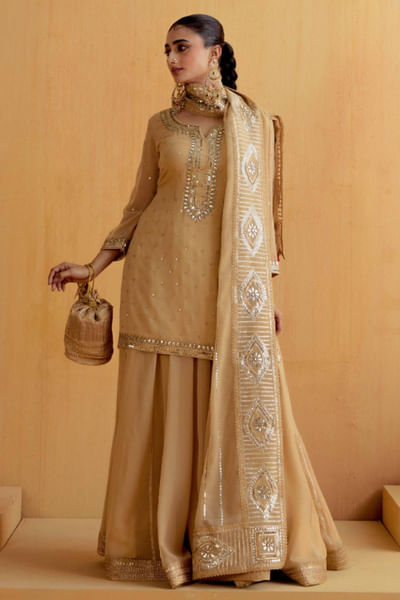 Gold gota embroidered kurta and lehenga set