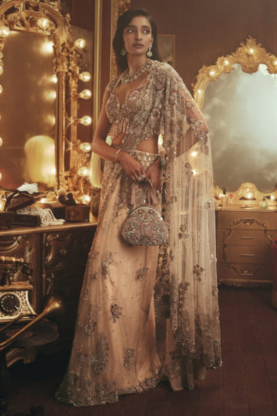 Beige hand embellished pre-draped sari set