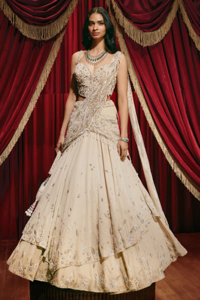 Ivory hand embroidered corset and lehenga set