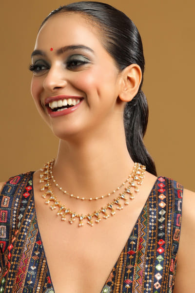 Gold kundan and pearl necklace