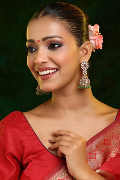 Multicoloured diamond stone jhumka earrings