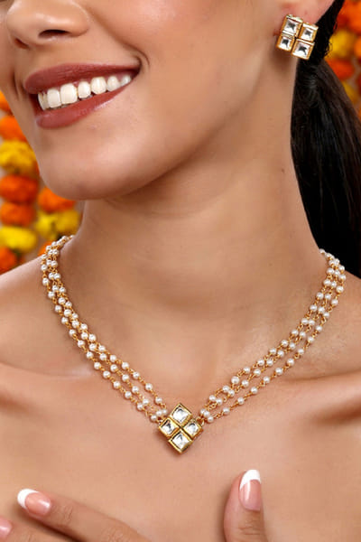 Gold kundan and pearl necklace set