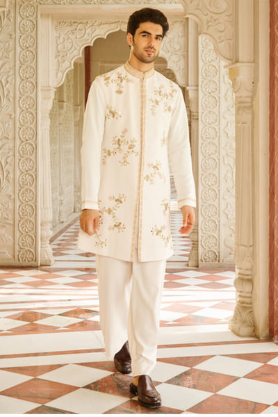 Cream embroidered sleeveless sherwani set