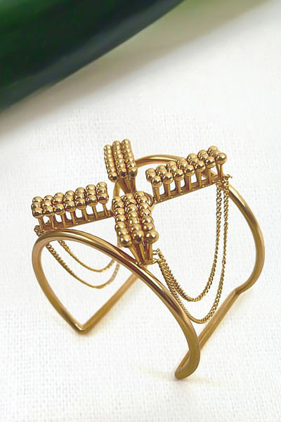 Gold chain detail hand cuff