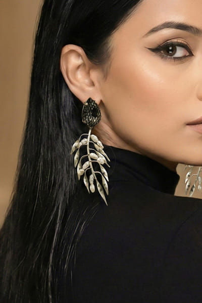 Silver leaf embellished statement earrings