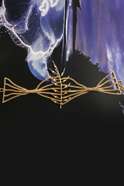 Gold wire and leaf embellished bracelet