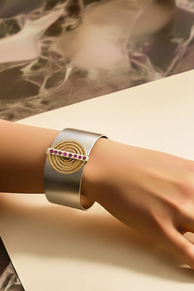 Gold disc and stone embellished cuff bracelet