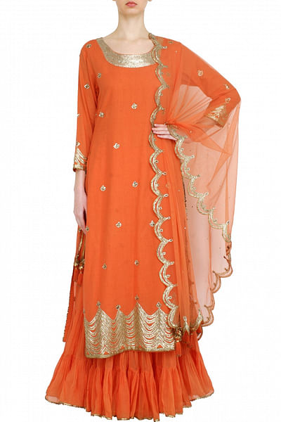 Bright orange kurta and skirt set