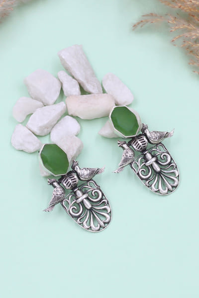 Green stone and bird oxidized silver earrings