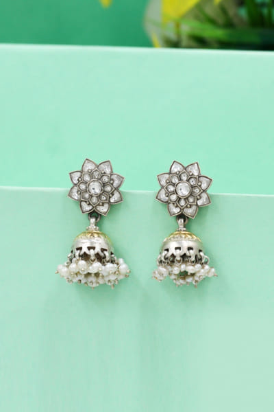 White floral kundan-enamel jhumka earrings