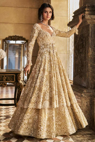 Cream thread embroidered jacket lehenga set