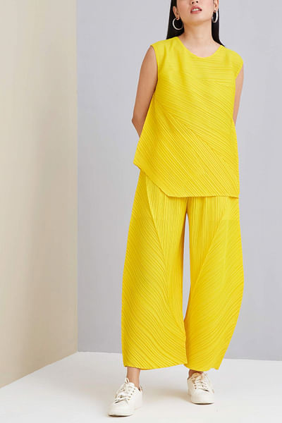 Yellow asymmetric top and trousers