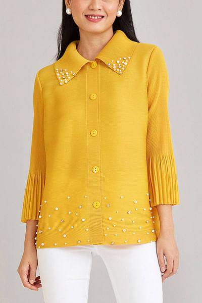 Yellow pleated shirt