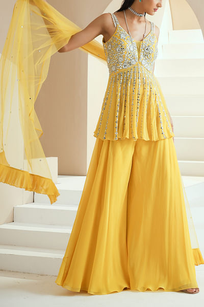 Yellow embellished peplum top and sharara