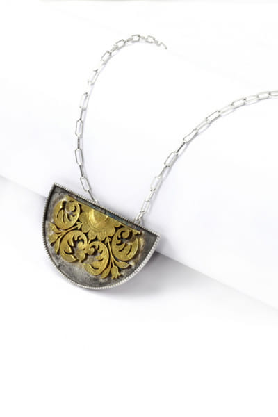 Silver floral pendant and chain