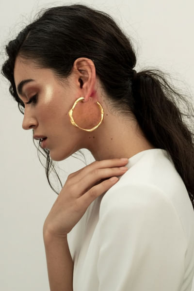 Gold plated textured hoop earrings