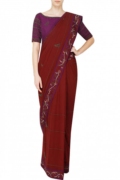 Maroon beadwork sari with purple blouse