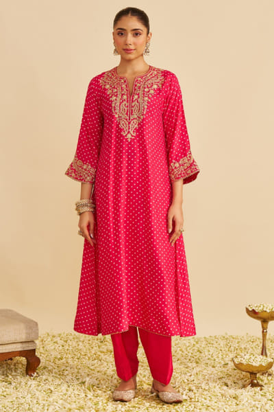 Hot pink aari embroidered long choga salwar set