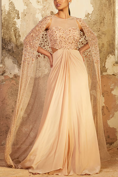 Beige draped gown and cape