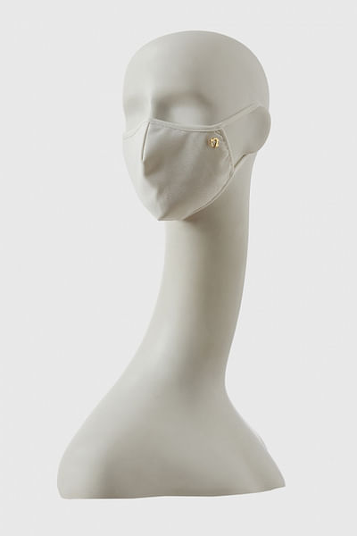 Ivory face mask with iconopin