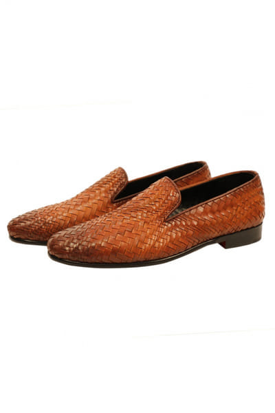 Tan woven leather slip-ons