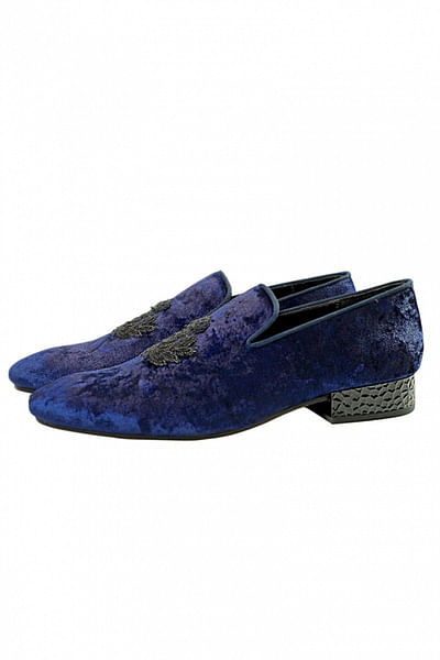 Navy blue embroidered slip-ons