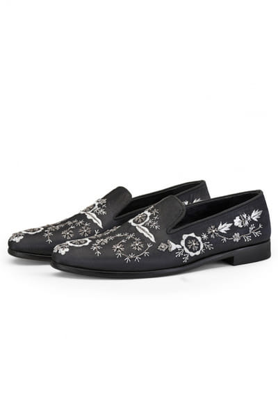 Black floral slip ons